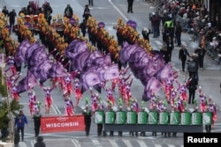 Greendale (Wis.) High School Marching Band performs during the 97th Macy's Thanksgiving Day Parade in New York, Nov. 23, 2023.