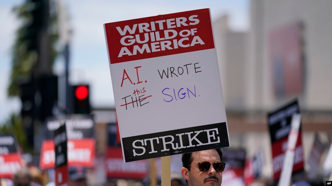 FILE - Members of the The Writers Guild of America picket outside Fox Studios on Tuesday, May 2, 2023, in Los Angeles. (AP Photo/Ashley Landis, File)