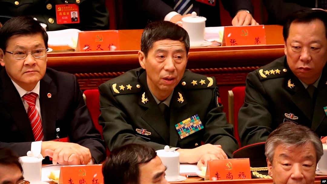 中國國防部長李尚福（中）