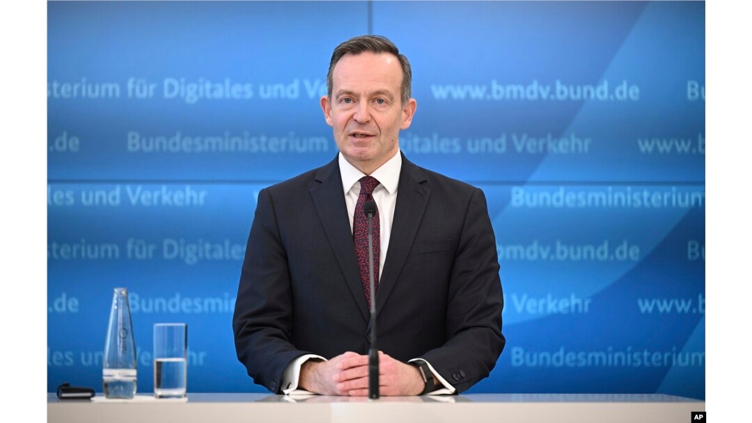 Volker Wissing, Federal Minister of Digital Affairs and Transport speaks on the use of e-fuels for new combustion engines even after 2035 and in the existing fleet in Berlin, Germany, Tuesday, Feb. 28, 2023. (Britta Pedersen/dpa via AP)