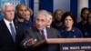 Dkt Anthony Fauci akiwa na Makamu wa Rais Mike Pence nyuma yake wakati akilipasha habari taifa na dunia juu ya hali ya maambukizi ya virusi vya corona, White House, Jumapili, Machi 2020.