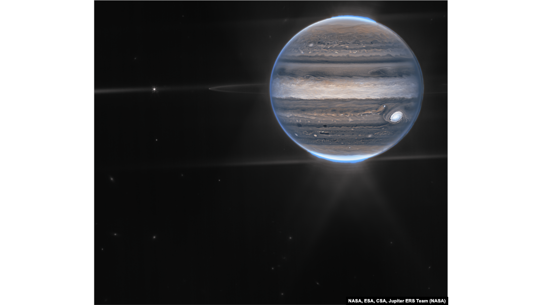 NASA’s James Webb Space Telescope captures new images of Jupiter showcasing auroras and hazes. Webb sees Jupiter with its faint rings, which are a million times fainter than the planet, and two tiny moons called Amalthea and Adrastea.