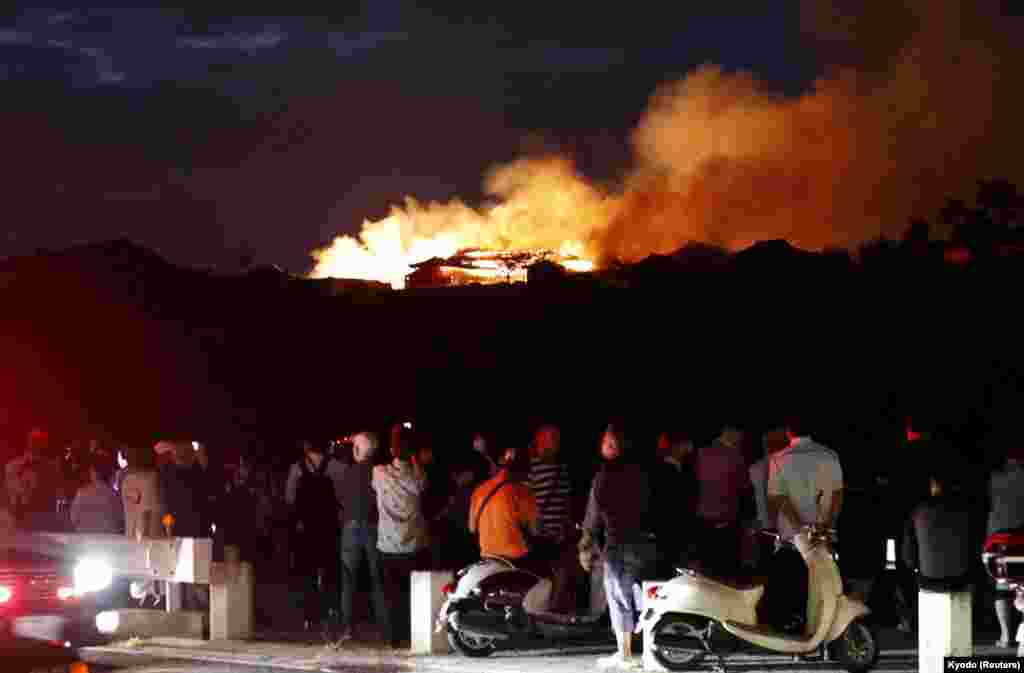 Shuri Castle, listed as a World Heritage site, goes up in flames, in Naha on the southern island of Okinawa, Japan, in this photo taken by Kyodo.