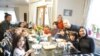 Sapsuda Angsunisanat (right), a Thai graduate student living near Hamburg, Germany, takes care of Ukrainian refugees picked up by her and her German husband Kai Lunstaden (center). They are hosted by a Thai housewife Patsunee Kubiak (left) and her husband Patryk Kubiak.