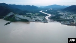 This frame grab from a video obtained from the Ethiopian Public Broadcaster on July 24, 2020, shows an aerial view of water levels at the Grand Ethiopian Renaissance Dam in Guba, Ethiopia.