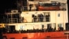 The Blue Sky M cargo ship, carrying an estimated 900 migrants, is seen at the Gallipoli harbour, southern Italy, Dec. 31, 2014. 