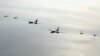 1일 한국 서해 상공에서 실시된 2023년 첫 미한 연합공중훈련에 미군 B-1B 전략폭격기(가운데)와 F-22 전투기(오른쪽), 한국군 F-35(왼쪽) 전투기가 동원됐다.
