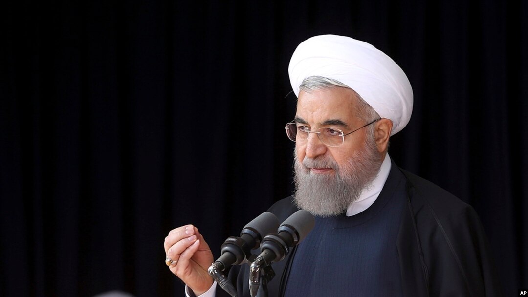 In this photo released by official website of the office of the Iranian Presidency, President Hassan Rouhani speaks to a crowd during a visit to the central city of Arak, Oct. 23, 2016.