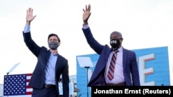 Abademokrate Jon Ossoff na Raphael Warnock mu myiyamamazo yo kwitoreza guserukira reta ya Georgia
