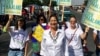 FILE - A photo shows 2018 Congressional candidate Deb Haaland, Democrat and a member of the San Felipe Pueblo with supporters at New Mexico State Fair in September 2017. 