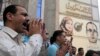FILE - Journalists and activists protest against the restriction of press freedom and to demand the release of detained journalists, in front of the Press Syndicate in Cairo, Egypt, April 26, 2016.