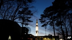 FILE - On Jan. 8, 2019, an employee leaves the U.S. Space & Rocket Center, which serves as the visitor center for the nearby NASA Marshall Space Flight Center, in Huntsville, Ala.