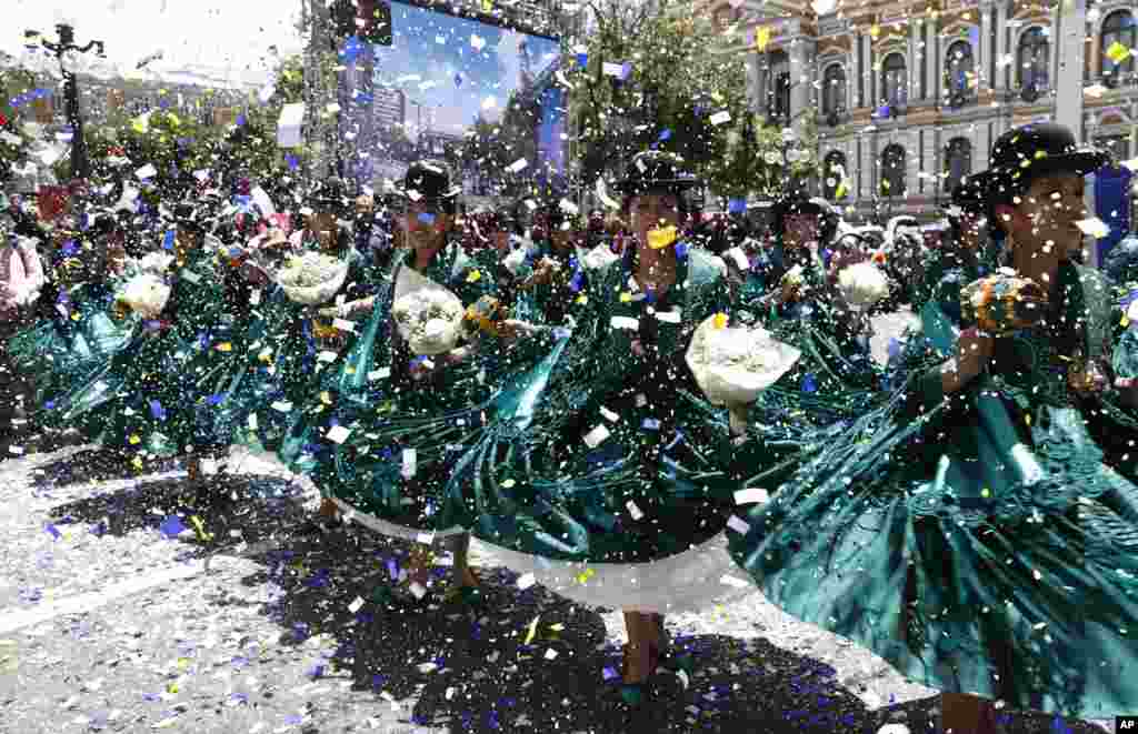 Dancers perform the "Morenada" during a parade in honor of "Jesus del Gran Poder," or Jesus of Great Power in La Paz, Bolivia, Dec. 14, 2019.