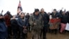 FILE - Nathan Phillips (C) marches with other protesters out of the main opposition camp against the Dakota Access oil pipeline near Cannon Ball, North Dakota.