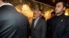 Iranian Foreign Minister Mohammad Javad Zari, center, departs meeting with EU foreign ministers, Iran Nuclear talks, Geneva, Nov. 9, 2013.