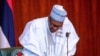 Shugaba Buhari a yayi da yake rattaba hannu kan kudirin yaki da almundahana a ranar 5 ga watan Yulin 2018.