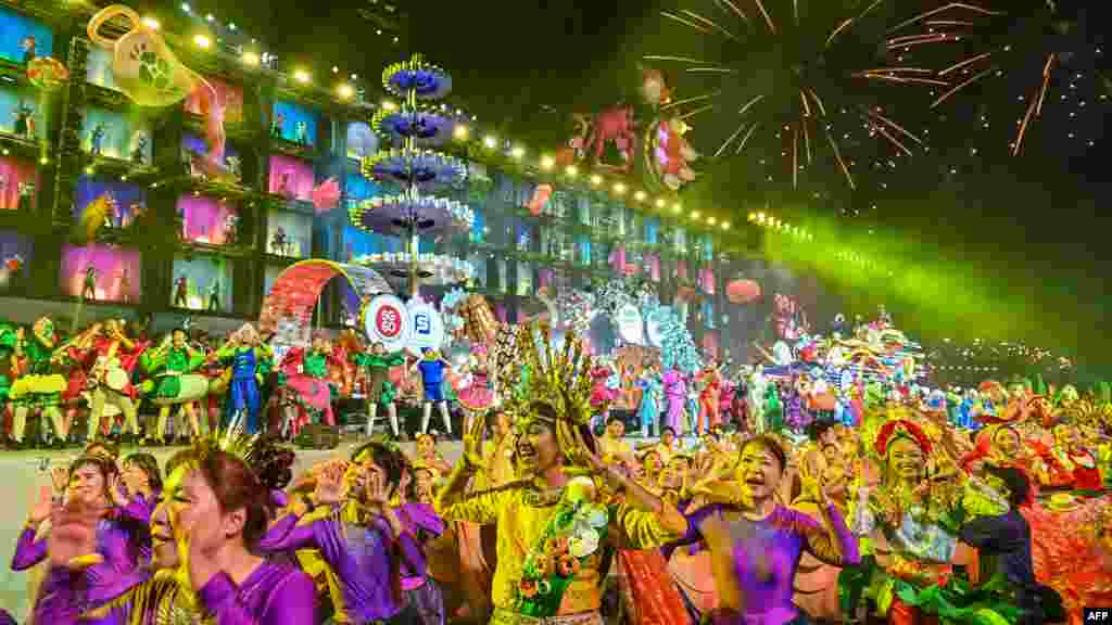 Performers take part in the annual Chinese Lunar New Year Chingay parade in Singapore.