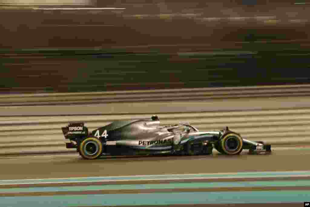 Mercedes driver Lewis Hamilton of Britain steers his car during the Emirates Formula One Grand Prix, at the Yas Marina racetrack in Abu Dhabi, United Arab Emirates.