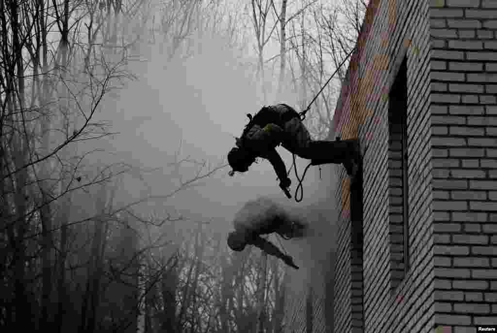 Members of the Grom (Thunder) special forces unit under Russia's Interior Ministry take part in a drill in Moscow Region, Russia.