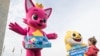 Pinkfong and Baby Shark cheer on the Washington Nationals with fans of all ages ahead of Game 3 of the World Series, Oct. 25, 2019.