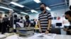 4 Journalists at Shut Hong Kong Paper Charged with Collusion 