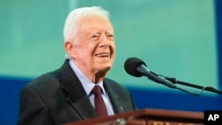 FILE - Former President Jimmy Carter is seen during the annual Carter Town Hall held at Emory University, in Atlanta, Georgia, Sept. 18, 2019.