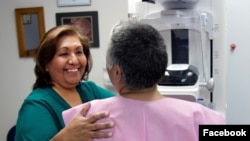 Photo shows a patient at the Phoenix Indian Medical Center (PIMC) preparing for a mammogram. Facebook/Indian Health Service/PIMC