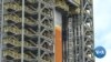 After Anniversary, NASA Aims Beyond Earth Orbit