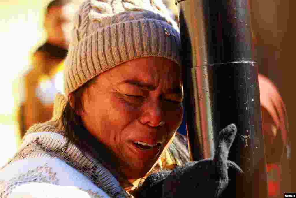 Margelis Tinoco, a migrant from Colombia, reacts after receiving news that her U.S. Customs and Border Protection (CBP) One appointment was cancelled on the inauguration day of Donald Trump's second presidential term, at the Paso del Norte International border bridge in Ciudad Juarez, Mexico on January 20, 2025.