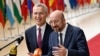 President of the European Council Charles Michel (R) talks to the media as he arrives with NATO Secretary General Jens Stoltenberg (L) for a European Council Summit, at the EU headquarters in Brussels, on June 29, 2023.