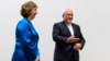 Iranian Foreign Minister Mohammad Javad Zarif (R) gestures next to European Union foreign policy chief Catherine Ashton , Oct. 15, 2013.