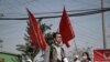 People protest in Mandalay, June 14, 2021.