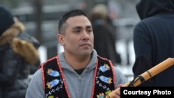 Ojibwe flutist Darren Thompson at the Indigenous Peoples March in Washington, D.C., Jan. 18, 2019. Photo by Mike Garcia.