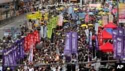  2018年的香港七一大游行。（美联社照片）
