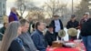 Montana Gov. Steve Bullock, third from left, speaks at an event marking the federal government’s formal recognition of the Little Shell Tribe of Chippewa Indians Friday, Dec. 20, 2019, at the state capitol in Helena, Mont. Congress passed a measure…
