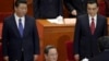 中国国家主席习近平、总理李克强和政协主席俞正声在政协会议主席台上（2015年3月3日）