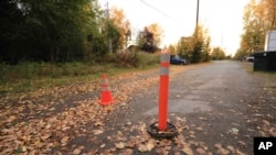 Leaves litter a street that was the scene of a 2017 attack on a Native woman in Anchorage, Alaska, by Justin Schneider, 34, who walked out of court a free man.