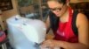 Natcha Morrow, once a Thai co-owner of sightseeing tour company in Los Angeles, sews fabric masks for sale as her alternative source of income during COVID-19 pandemic