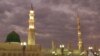 FILE -- In this July 5, 2013 file photo, worshipers visit the Prophet's Mosque in Medina, Saudi Arabia.