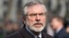 Sinn Fein president Gerry Adams arrives at the funeral of veteran British Labour politician Tony Benn at St. Margaret's Church, Westminster Abbey in London, March 27, 2014.