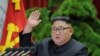 This picture taken during the period of December 28 to December 31, 2019 and released from North Korea's official Korean Central News Agency (KCNA) on January 1, 2020 shows North Korean leader Kim Jong Un attending a session of the 5th Plenary…