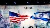 Workers prepare the stage at the American Israel Public Affairs Committee (AIPAC) policy conference in Washington, March 2, 2015. The United States and Israel showed signs of seeking to defuse tensions on Sunday ahead of a speech in Washington by Israeli 