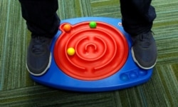 Toys like this double-maze board activity play system help develop motor skills, learning and concentration for autistic children.