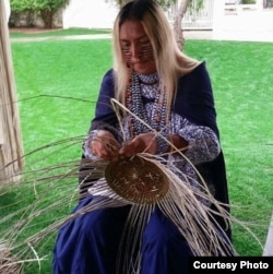 Shown is Timothy "Twix" Ward, San Carlos Apache two spirit, who specializes in the traditional craft of basket weaving. Courtesy: powwows.com