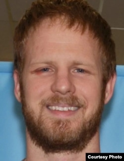 Police photo of Justin Schneider, 34. Convicted of kidnapping and assaulting an Alaska Native woman on August 15, 2017, he was given a "pass" by Alaska Superior Court Judge Michael Corey and will serve no jail time. Courtesy: Anchorage Police Department.