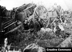Métis men with Red River carts, possibly taken in Minnesota. 1859 photo by an unknown photographer