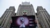 Andrei Nikolayev, an activist of the Green Alternative party, protests outside the Foreign Ministry headquarters building, to call on officials to do more to prevent the spread of the coronavirus, in Moscow, Jan. 24, 2020.
