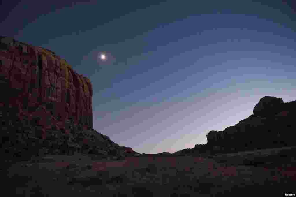 The moon glows over Indian Creek in the northern portion of Bears Ears National Monument, Utah, Oct. 29, 2017.