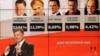 Ukrainian businessman, politician and presidential candidate Petro Poroshenko speaks to supporters in front of a board showing exit poll results for himself and other candidates (L-R) Yulia Tymoshenko, Oleh Lyashko, Anatoly Gritsenko and Serhiy Tigipko at