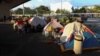 ARCHIVO - Migrantes venezolanos esperan por su cita para pedir asilo al gobierno de Estados Unidos en Tuxla Gutiérrez, Chiapas, en la frontera mexicana, el 16 de enero de 2025.
